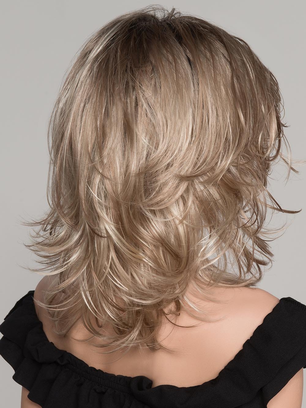 This no-fuss style is ready to wear right out of the box. Ocean has a hand tied mono part. Velvet lined ear tabs with adjustable straps at the nape for a personalized look *STYLED IMAGE: Tousled hair finished with BeautiMark Stay & Hold Hairspray*
