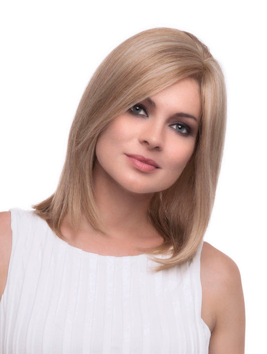 headshot of model wearing blonde shoulder length wig
