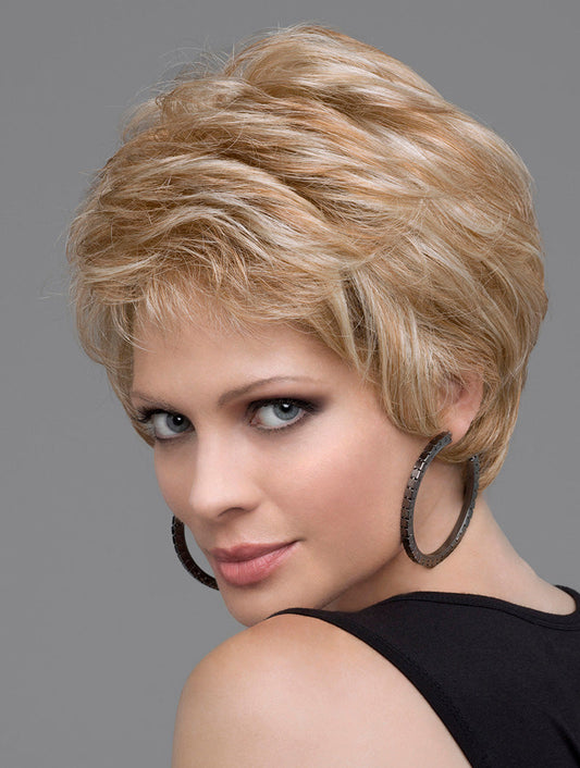 model lookin over her shoulder wearing blonde wig